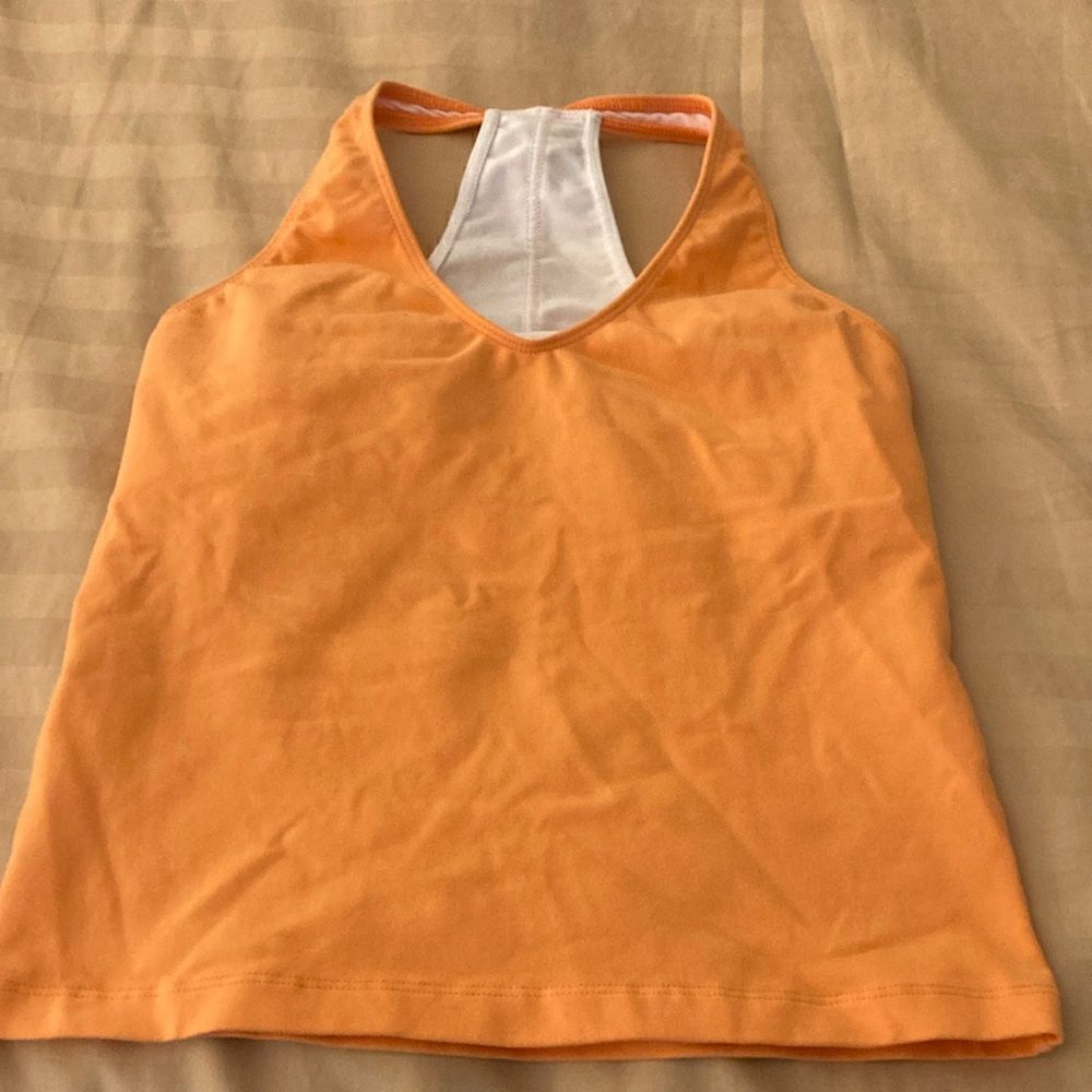 Racerback Tangerine Tank Top with V Neck and built in bra. Size Small.